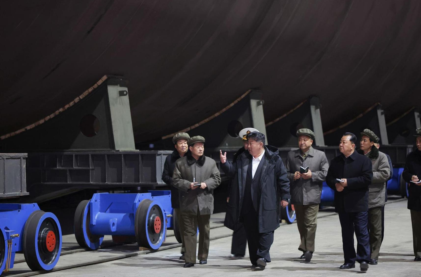 North Korea Unveils Nuclear Submarine: Photos Ignite Global Debate